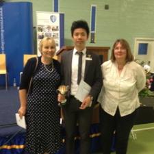 Albert receiving his award with WHG Local Guardian