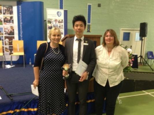 Albert receiving his award with WHG Local Guardian